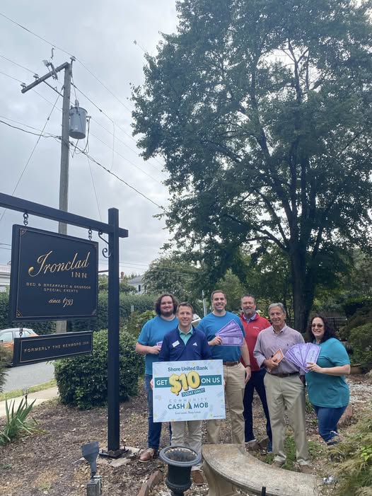 father and daughter playing on the living room floor 